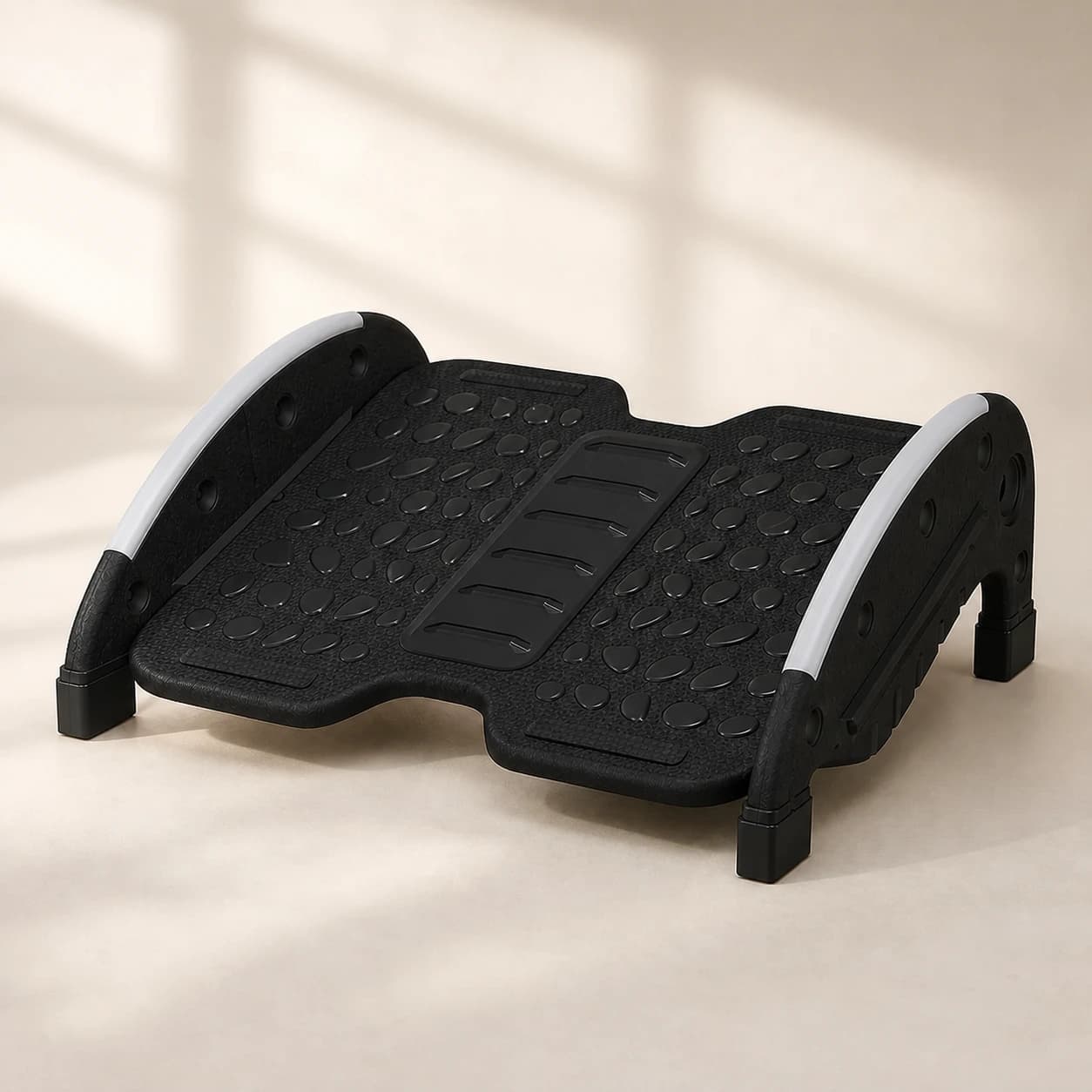 FlexRock Duo black two-mode footrest on a warm light studio background